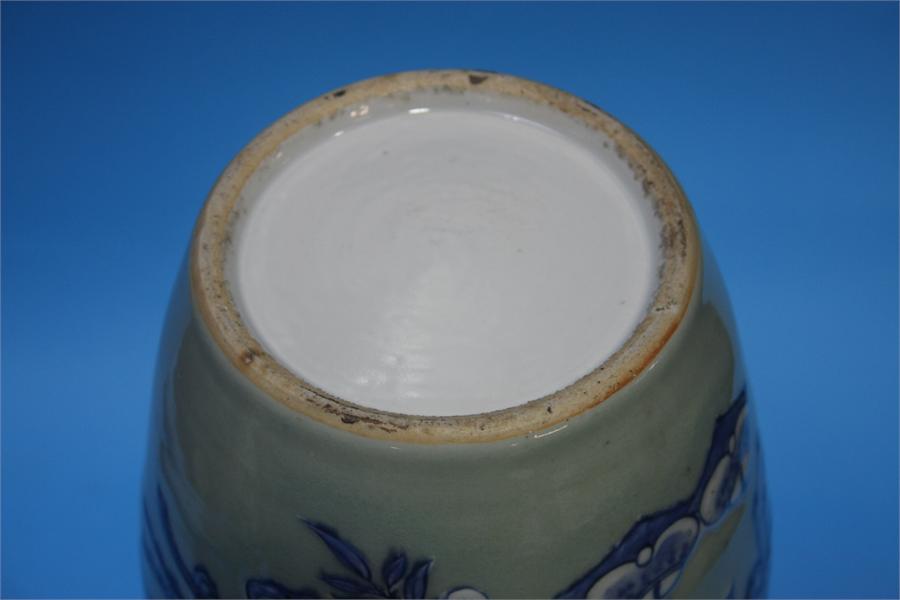 A late 19th century Chinese Celadon vase, decorated in blue relief. 41 cm high - Image 9 of 9