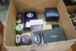 Box of Halcyon Days pill boxes.