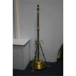 A brass Art Nouveau style standard lamp.