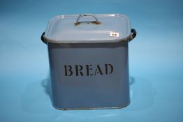 A blue enamelled bread bin.