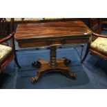 A 19th Century mahogany fold over tea table.