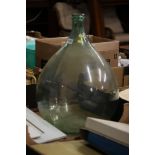 A glass Carboy.
