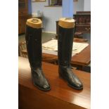 A pair of riding boots.