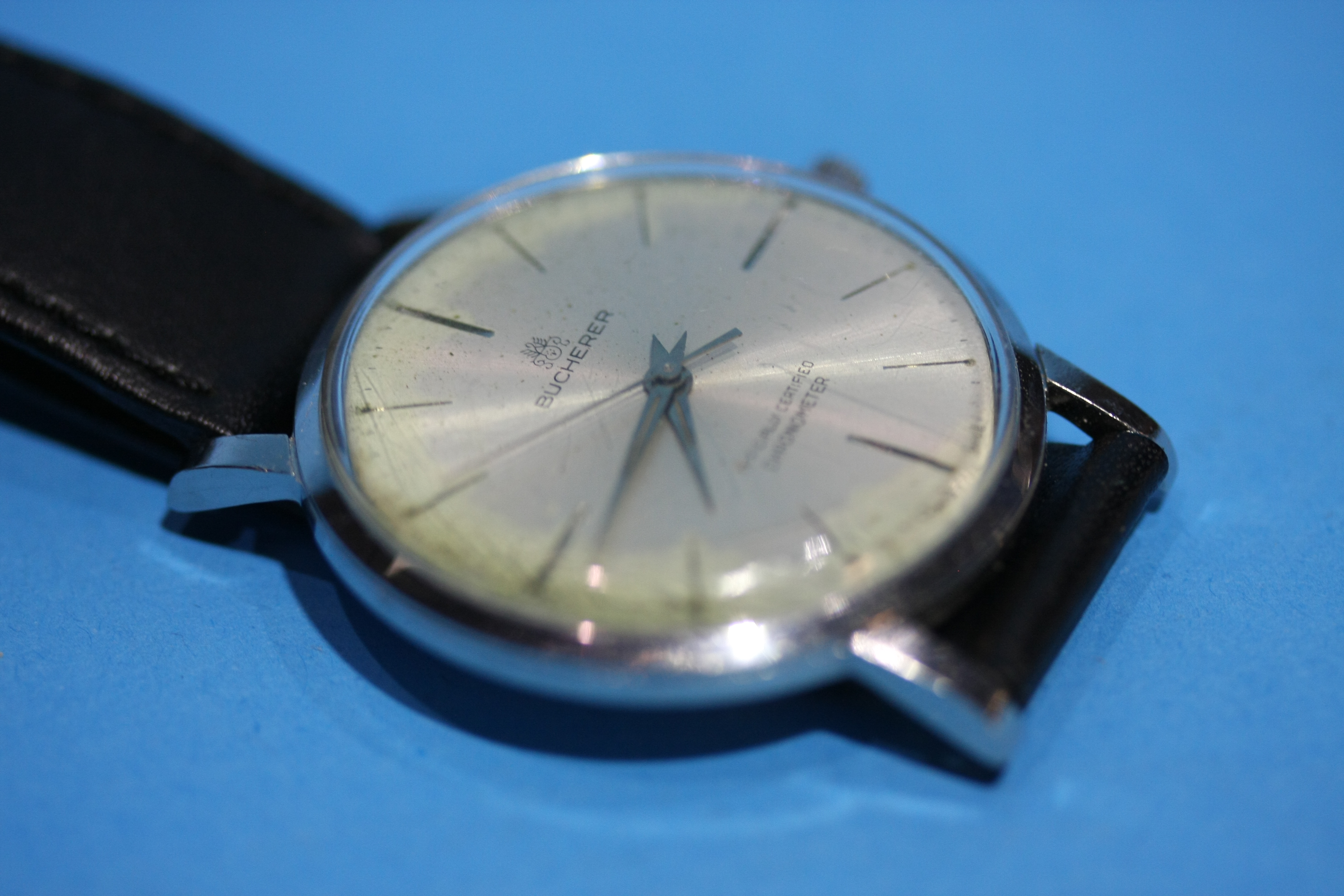 A Gents stainless steel Bucherer wristwatch.