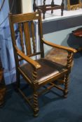 An oak barley twist carver chair.