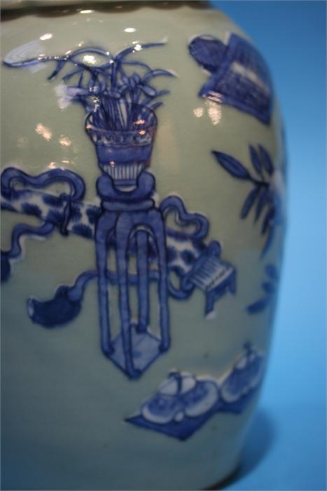 A late 19th century Chinese Celadon vase, decorated in blue relief. 41 cm high - Image 6 of 9