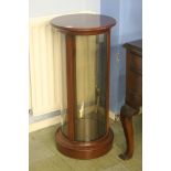 A cylinder display cabinet.