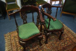 A pair of reproduction mahogany corner chairs.
