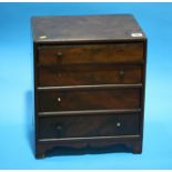 A 19th Century mahogany miniature chest of drawers.