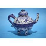 A Chinese blue and white teapot.
