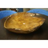 A large wooden bowl.