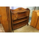 An oak open bookcase.