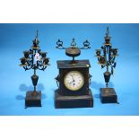 A Victorian slate clock garniture.