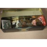 Tin of coins and bank notes