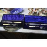 Two cased fish servers etc.