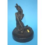 Bronze figure of a lady on a phone