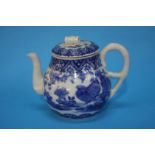 An Oriental blue and white tea pot