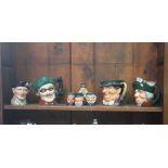 A collection of eight various Royal Doulton Toby and Character jugs