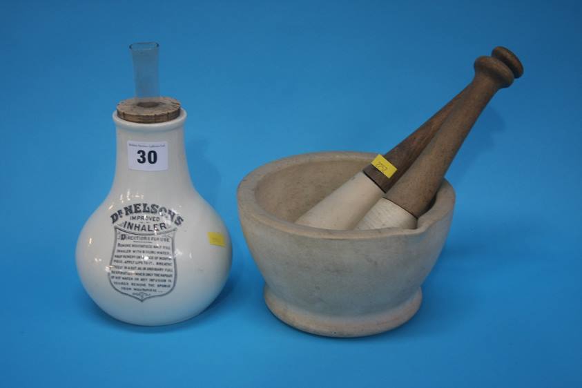 A pestle and mortar and a Dr. Nelson's improved inhaler