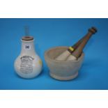 A pestle and mortar and a Dr. Nelson's improved inhaler