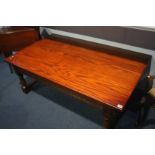 A large oak Old Charm coffee table, 140cm length, 84cm width