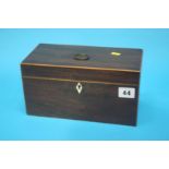 A mahogany tea caddy, with box wood stringing