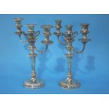 Pair of plated candelabras and a coffee pot