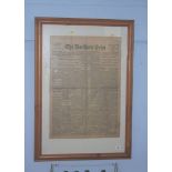 A framed copy of The Northern Echo and a model of The Titanic