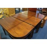 A Georgian mahogany D-end dining table