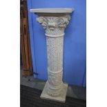 A Corinthian style cast resin stand