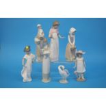 Three Lladro and four Nao figures (7)