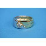 An 18ct bicolour gold ring set with solitaire diam