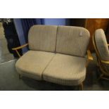 An Ercol two seater settee