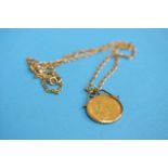 A gold mounted 1/2 sovereign, dated 1913 and a 9ct gold chain. Total weight 8.2 grams