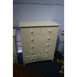 A cream chest of drawers