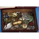 A jewellery box containing swivel fob, riding crop bar brooch, various other brooches etc.