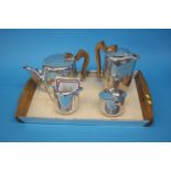 A Picquot ware tea set including water jug and tray (5)