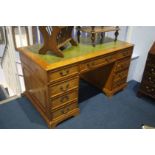 A pedestal desk. 137cm wide