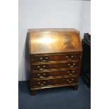 A reproduction Bevan and Funnel mahogany bureau. 75cm wide