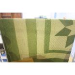 Green and yellow quilt, with plain green reverse
