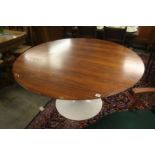 An Arkana style Tulip dining table with teak top