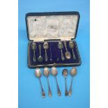 Cased set of six spoons, a pair of sugar nips and