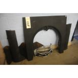 A cast iron fire surround