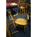 A towel rail and a rocking chair