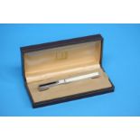A boxed Dunhill fountain pen, the engine turned bo