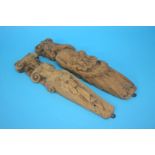 Two small carved oak corbels