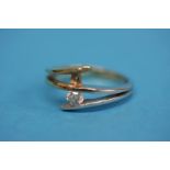 A 14ct gold bicolour ring with one diamond (one missing). Total weight 3.6 grams