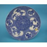 A large Oriental blue and white china charger. 41cm diameter