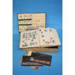 Collection of assorted stamps in one box