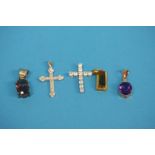 A 9ct gold pendant, two 925 silver pendants and two small 925 crosses (5)